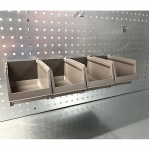 Plastic tray strip 555 mm with fixing to the perforated panel